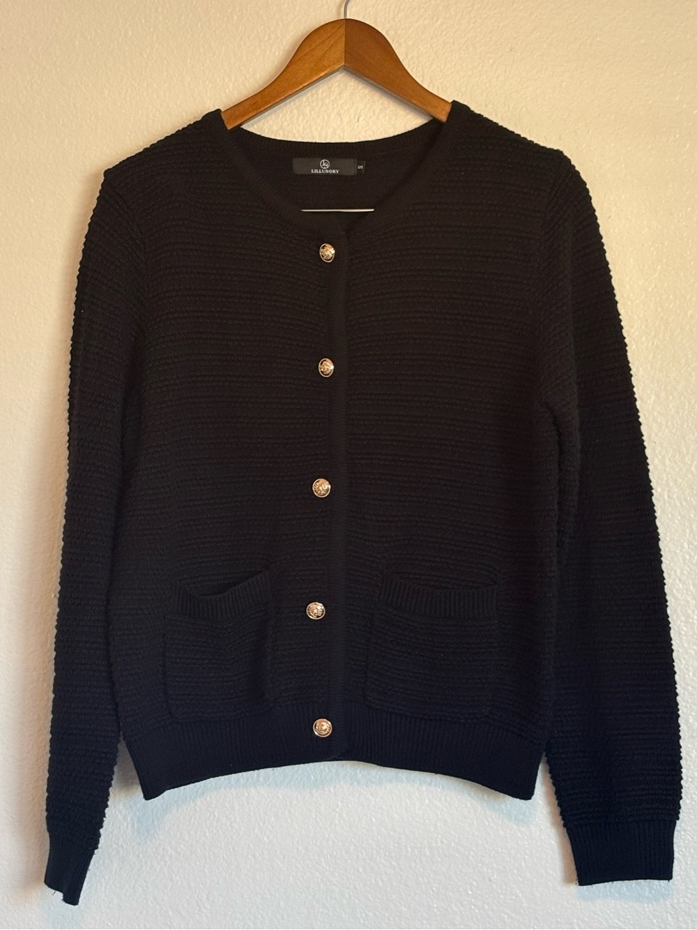 Black Knit Button-Front Sweater Cardigan with gold tone burtons.